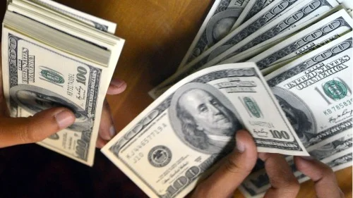 为了应付美元兑换危机及打击对手，中共已将印刷假美元作为一种国家战略出手（图片来源：Getty Images）