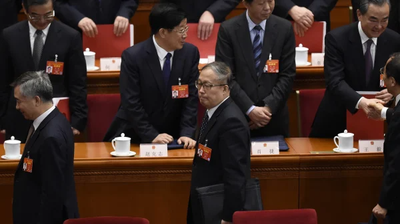 李鸿忠（中）参加两会的资料照（图片来源: WANG ZHAO/AFP/Getty Images）